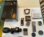 OM Systems OM-1 digital mirrorless camera with 12-40mm f2.8 Pro II lens